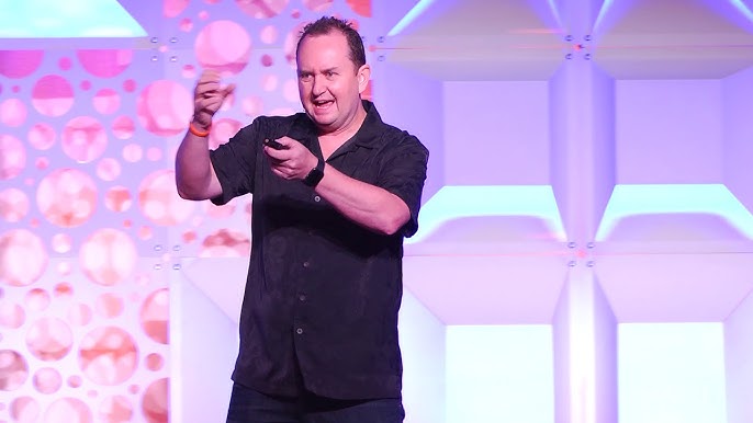 Steve Simonson speaking on stage — entrepreneur business coach